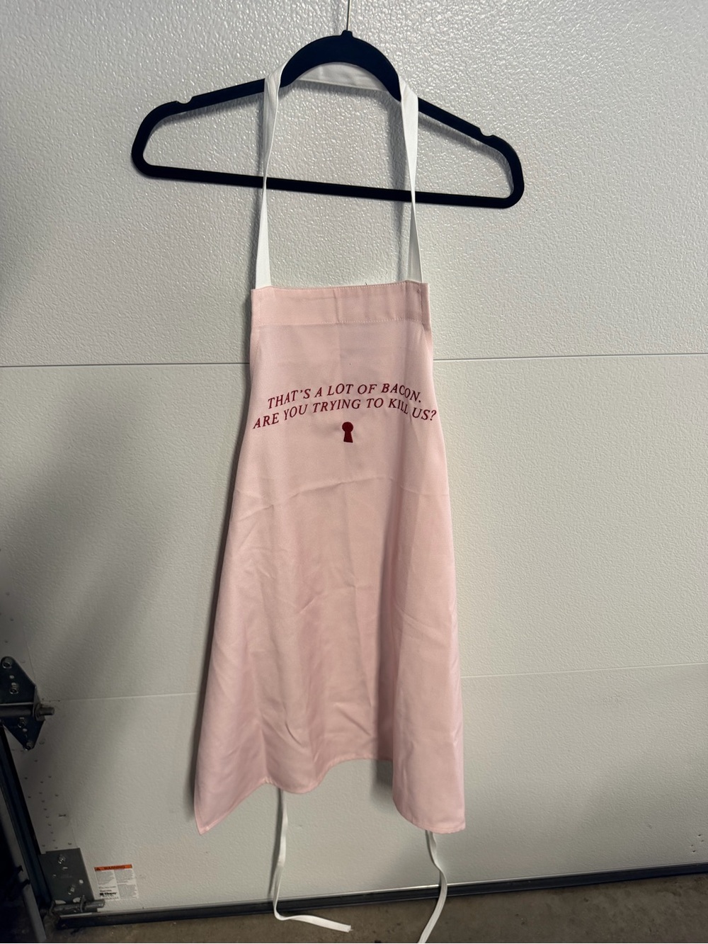 HOUSEMAID Pink Graphic Kitchen Apron with Red Text